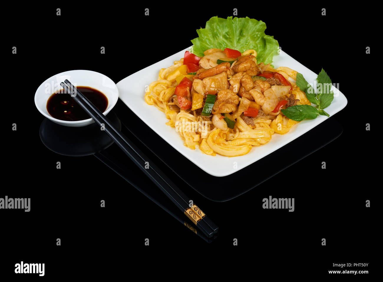 Vietnamese dish Pho Xao Hai San is a stirfried rice noodles with