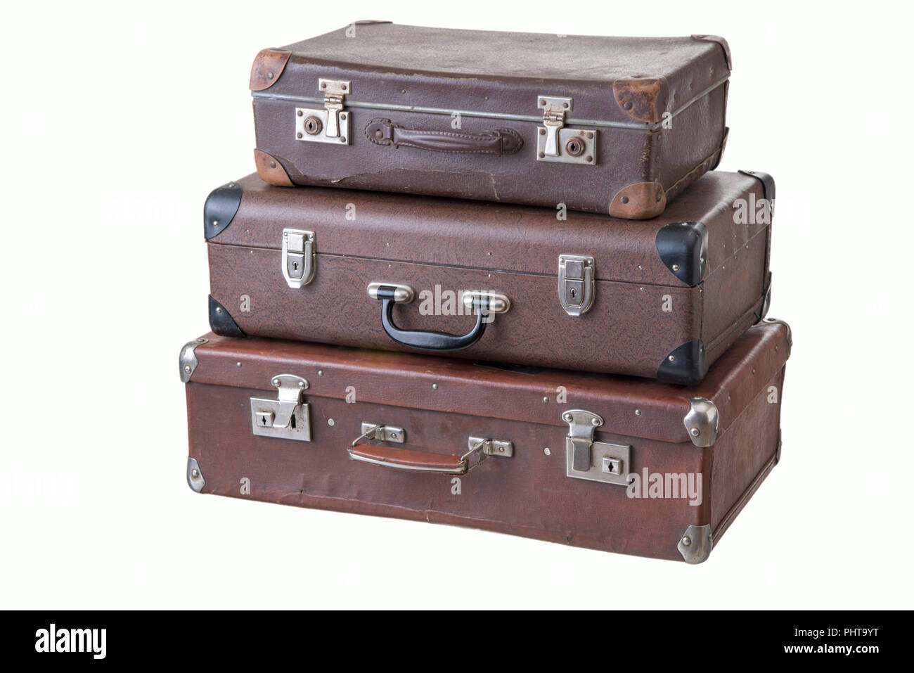 set of three fashionable vintage suitcases of different size, isolated