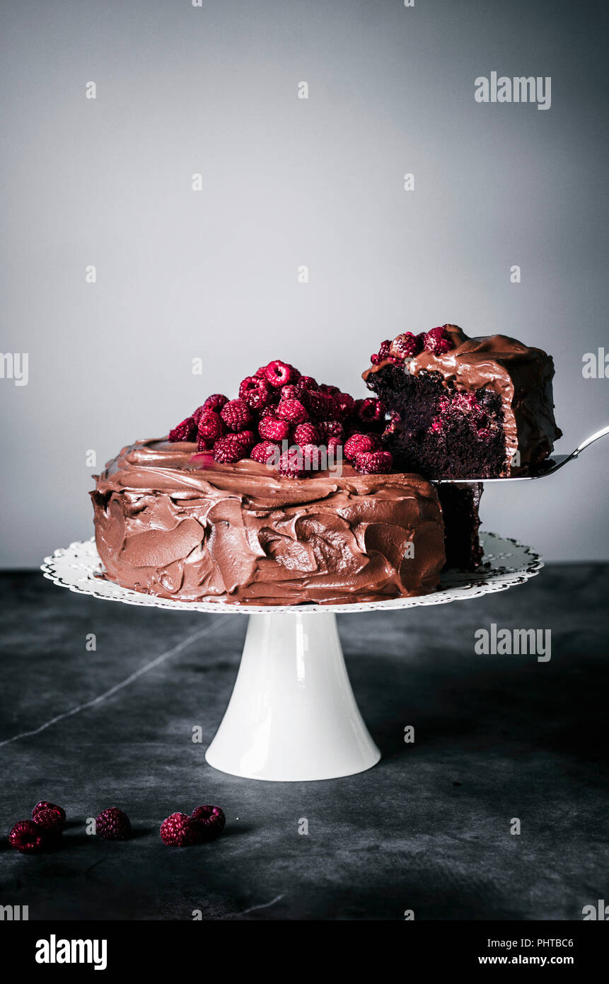 Chocolate raspberry cake with coconut milk chocolate ganache Stock