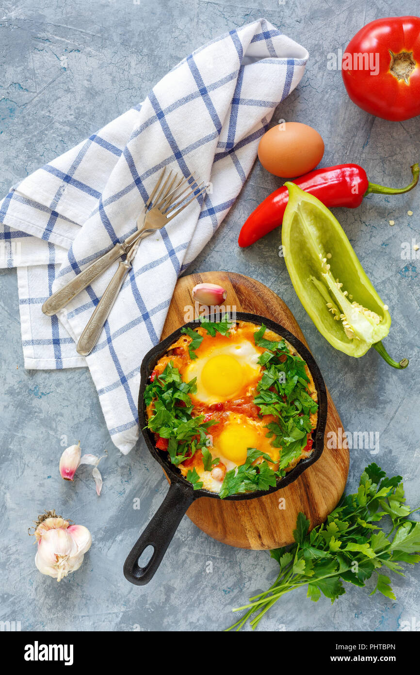 Shakshukaeggs in tomato sauce Stock Photo Alamy