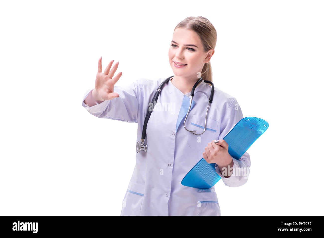 Young woman doctor isolated on white background Stock Photo - Alamy