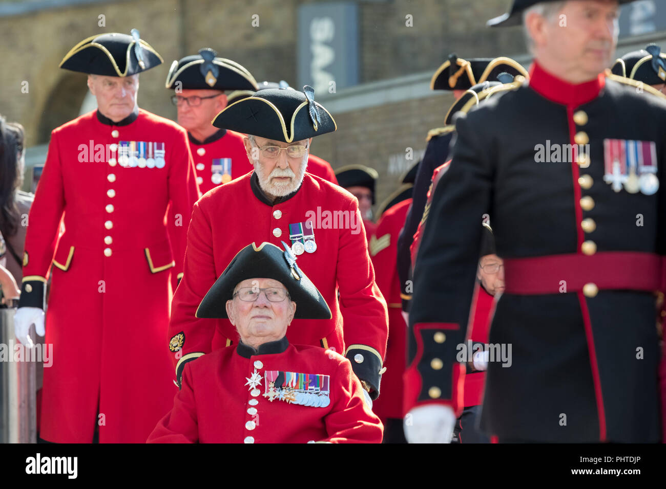 Chelsea Pensioners march on King's Road in London to commemorate the end of the First World War. Stock Photo