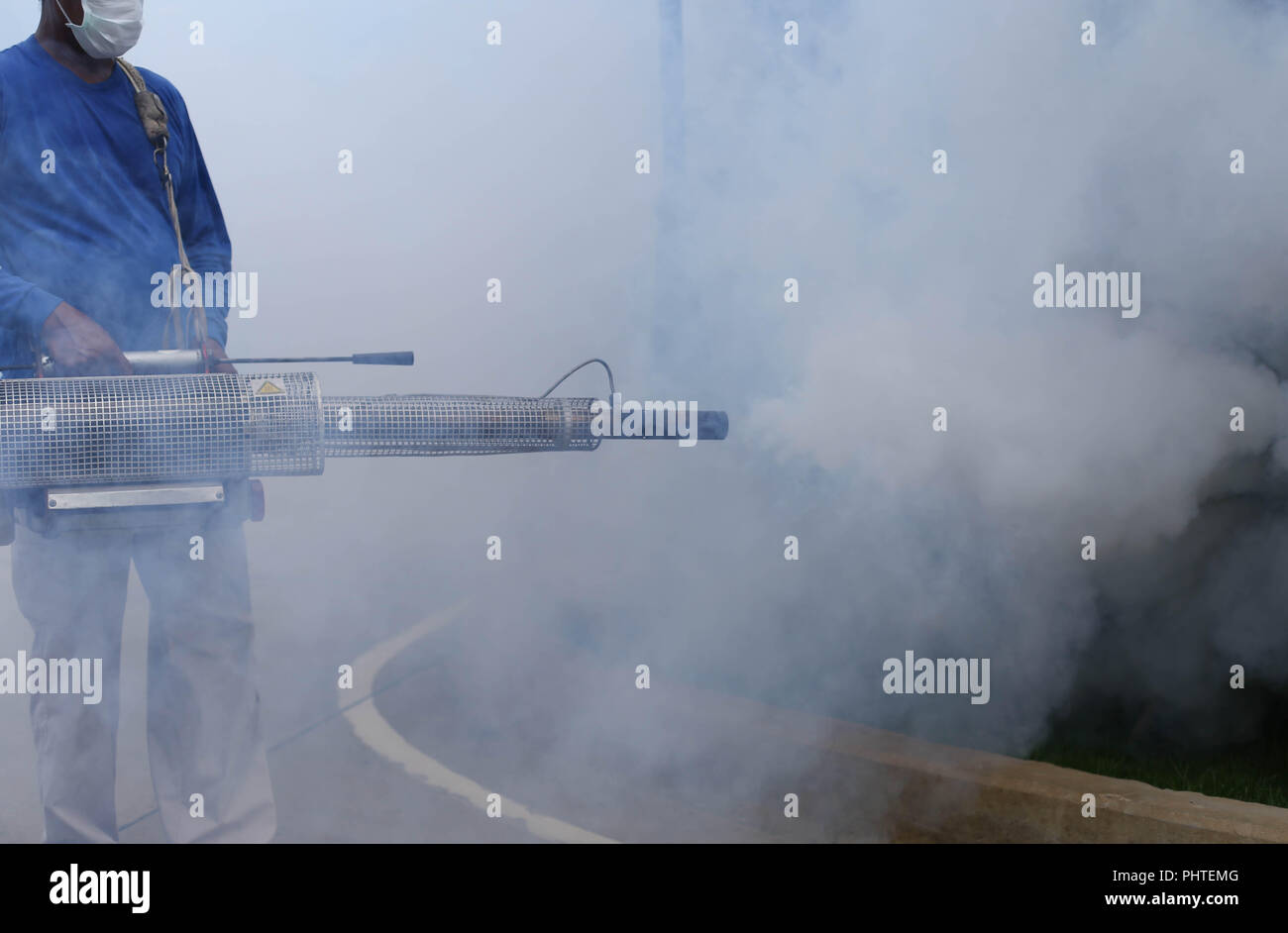 Fogging mosquito to prevent of dengue fever Stock Photo Alamy