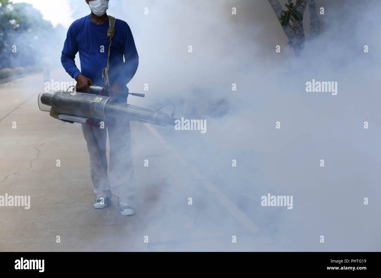 Fogging mosquito to prevent of dengue fever Stock Photo Alamy