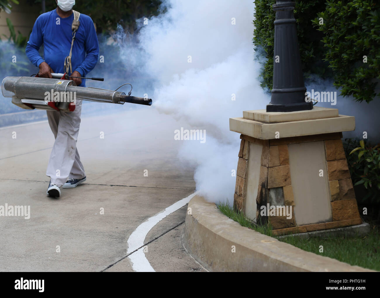 Fogging mosquito to prevent of dengue fever Stock Photo Alamy