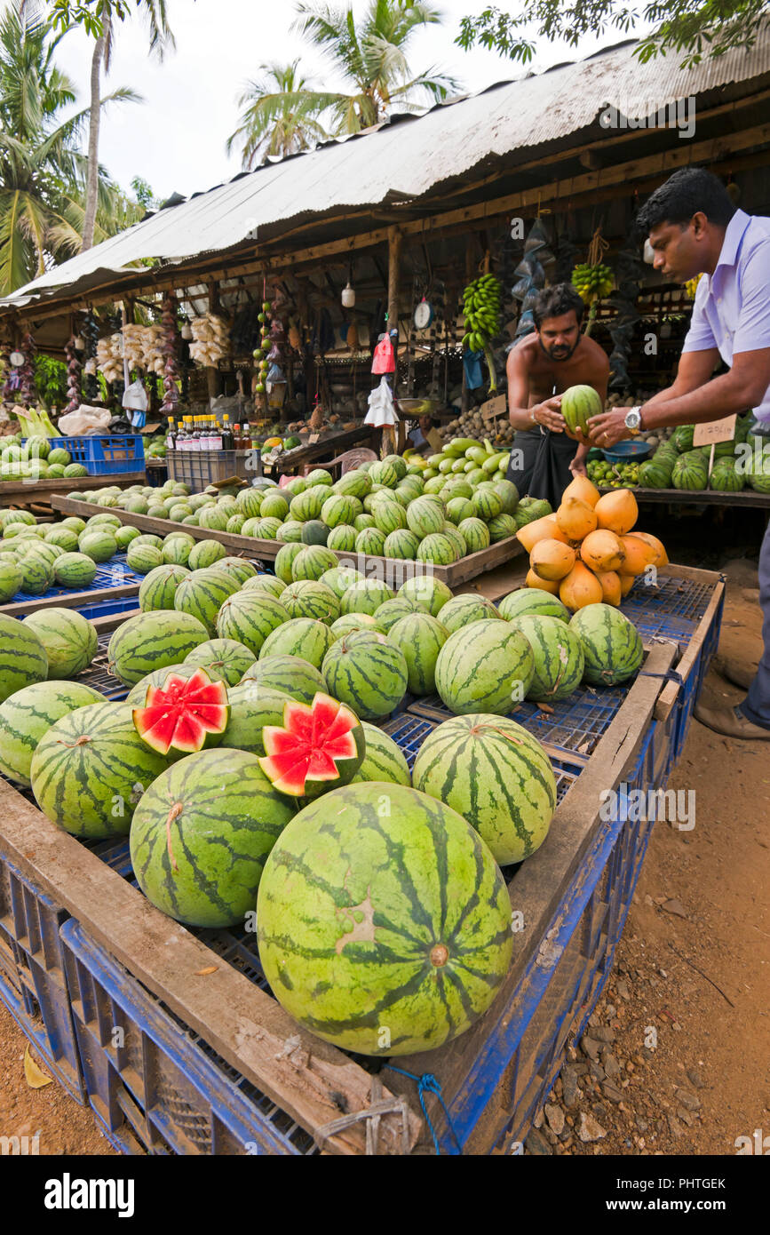 Vertical view of a roadside stall selling watermelons in Sri Lanka. Stock Photo