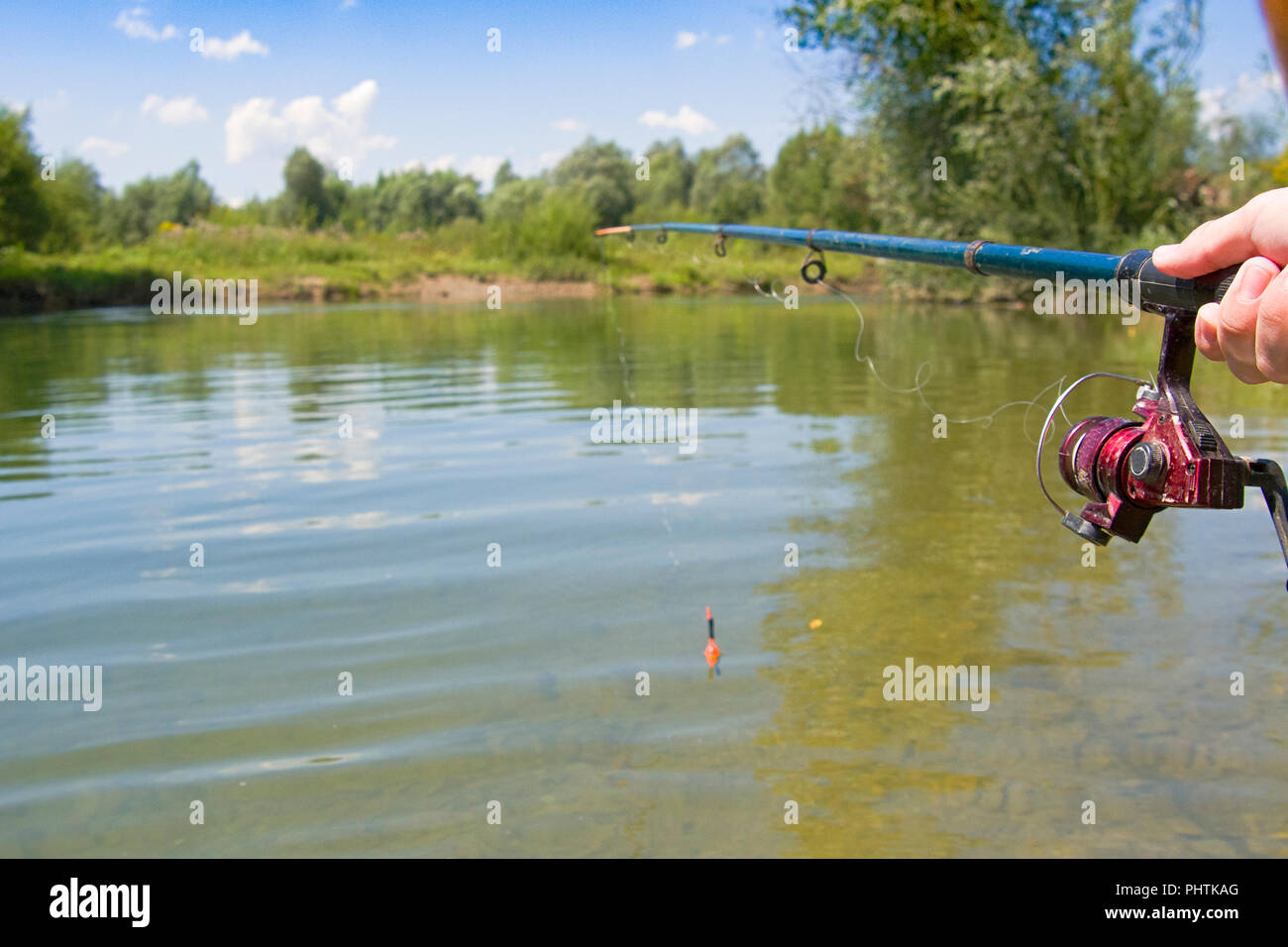 fishing with rod on lake. A close up Stock Photo