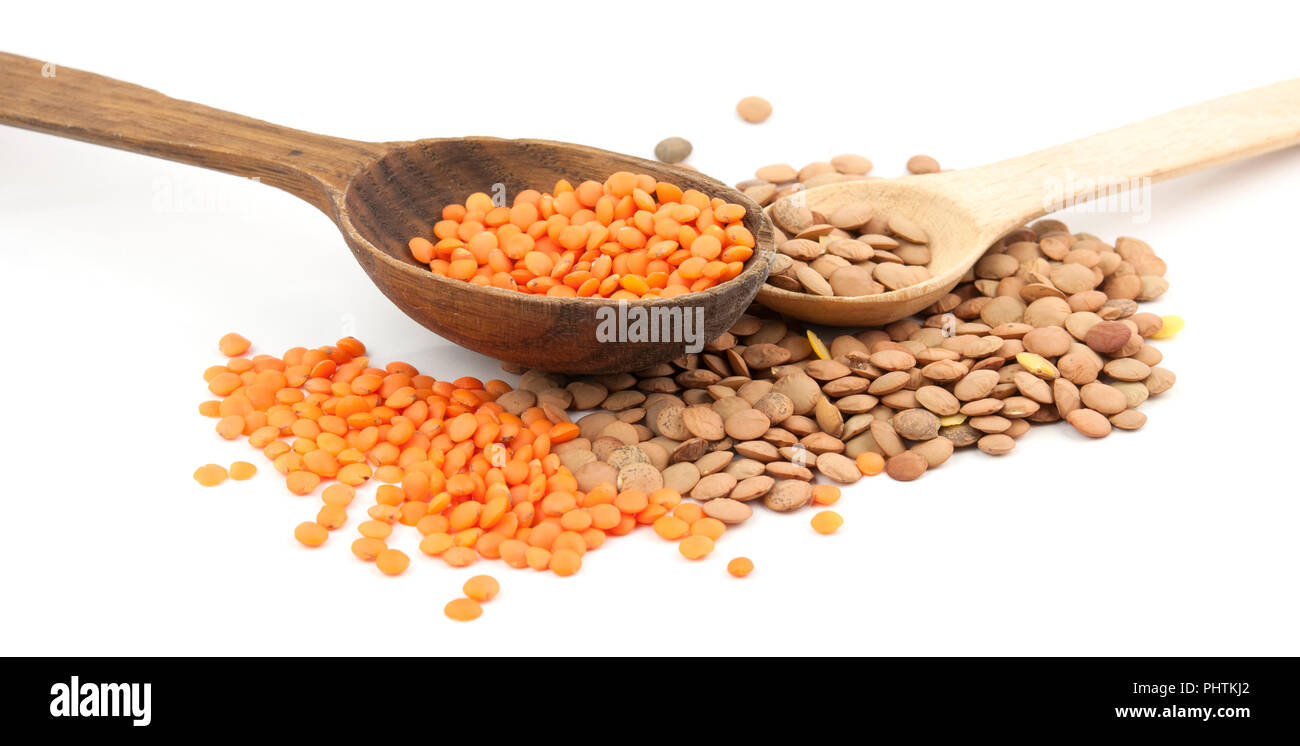 lentils wooden spoons isolated on a white Stock Photo