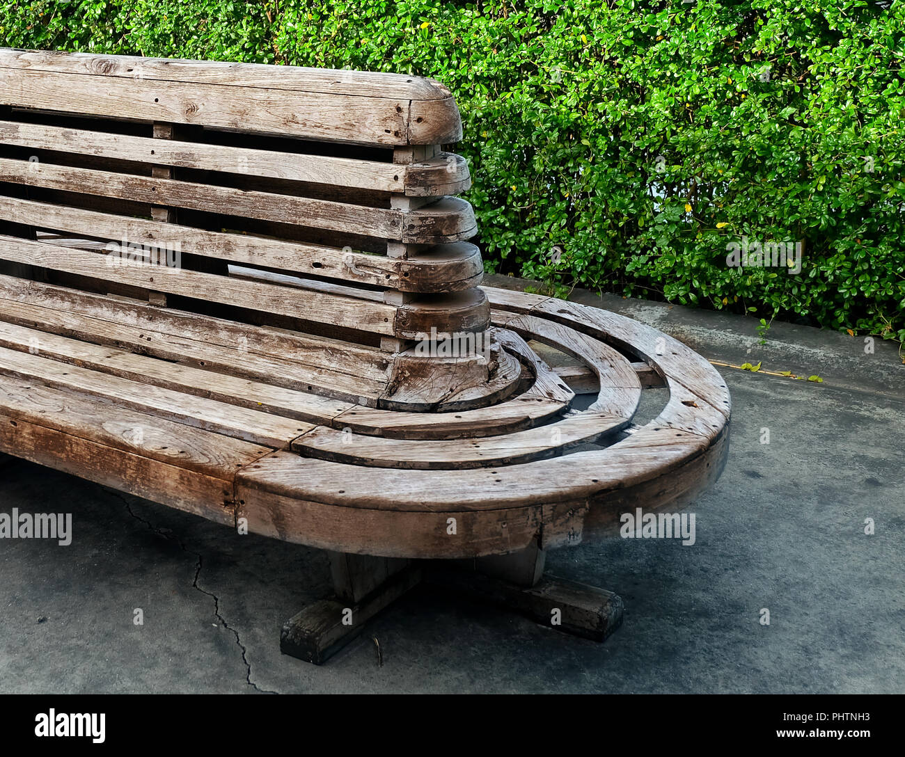 Beautiful Decorative Brown Wooden Park Bench Standing On A