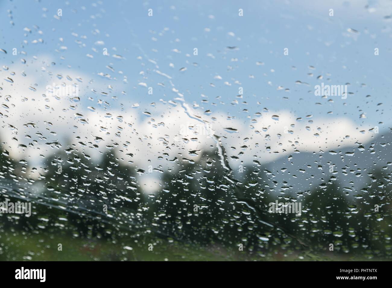 Raindrops on a car windshield Stock Photo - Alamy