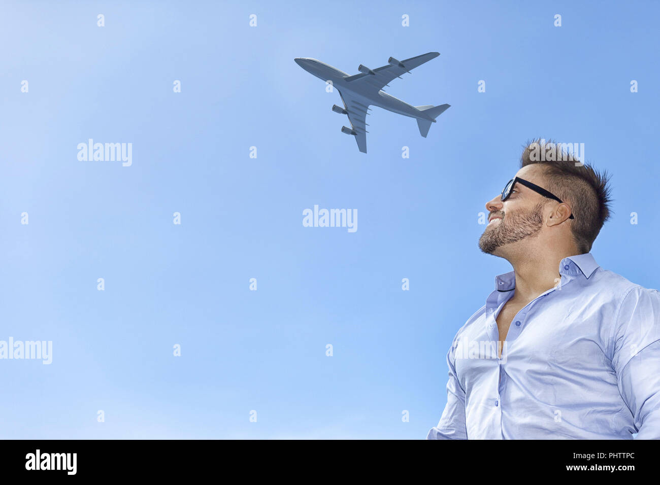 bearded man blue sky airplane Stock Photo - Alamy