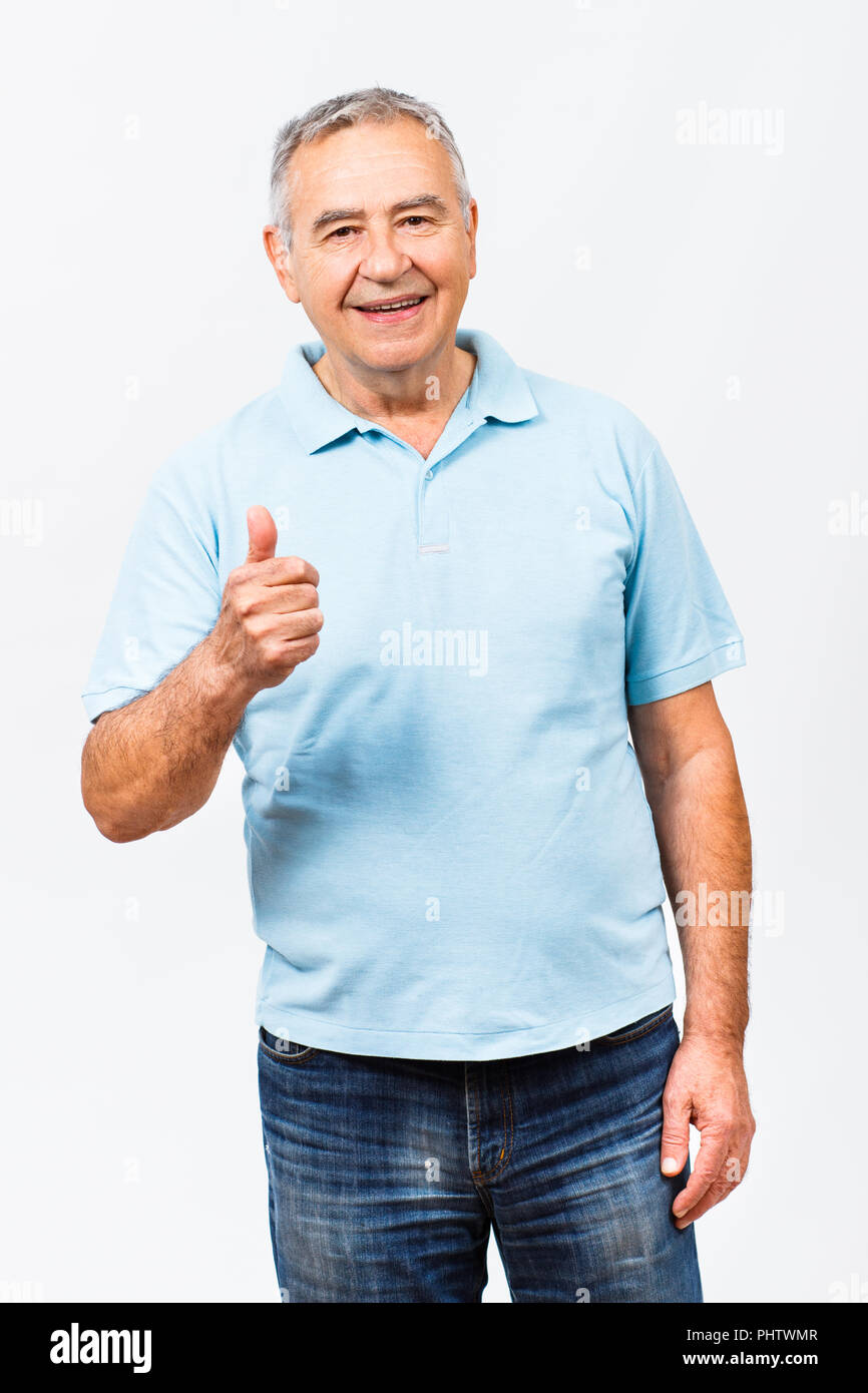 Happy senior man with thumb up Stock Photo - Alamy
