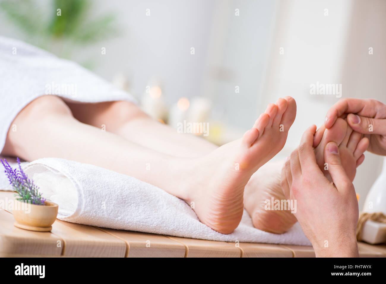 Foot massage in medical spa Stock Photo Alamy