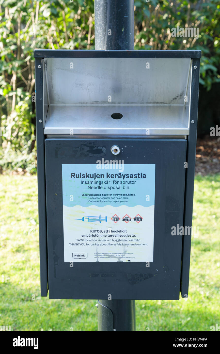 Safe community needle disposal box in a Helsinki park. Stock Photo