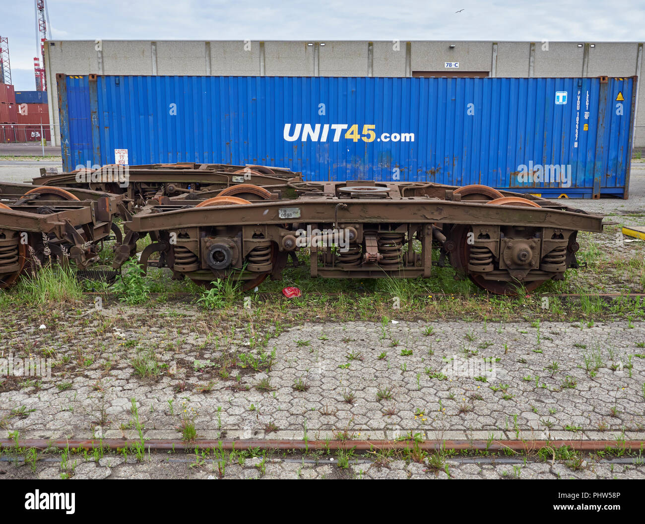 Old Train Bogies taken from dismantled Trains on tracks at Container Port in Amsterdam, The Netherlands. Stock Photo