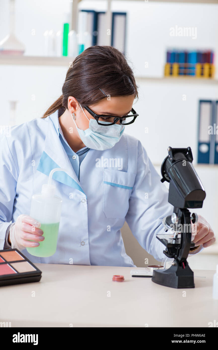 Make Up Making Lab Lab chemist checking beauty and make-up products Stock Photo - Alamy