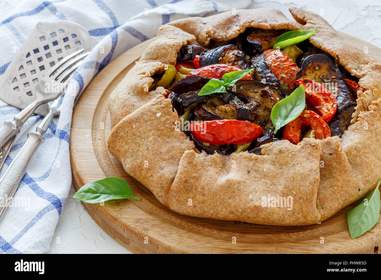 Homemade whole-grain galette with vegetables. Stock Photo
