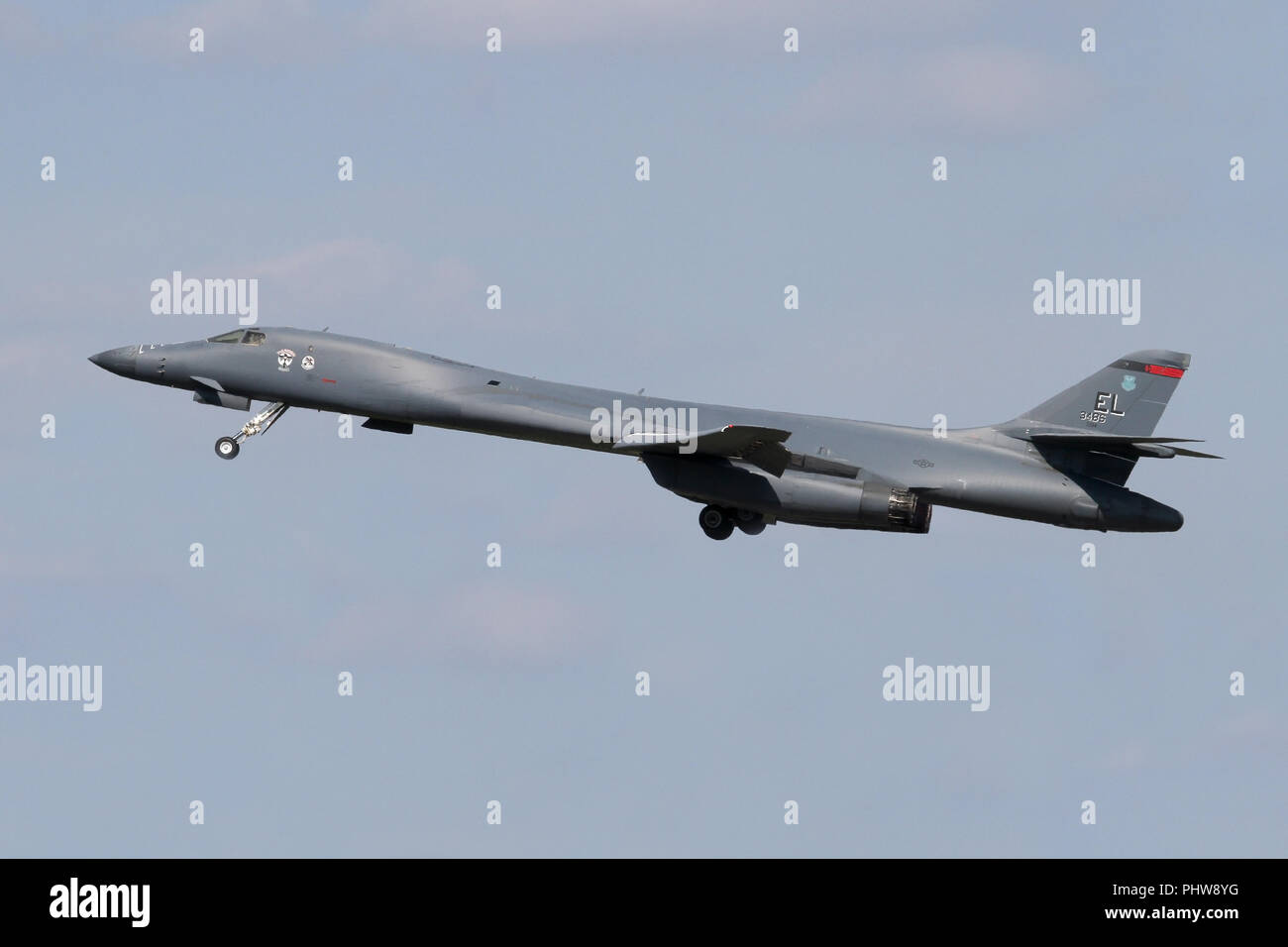 Rockwell B-1B Lancer from the 34th Bomb Squadron at Ellsworth AFB, South Dakota climbing out of RAF Mildenhall, Suffolk after a brief fuel stop. Stock Photo