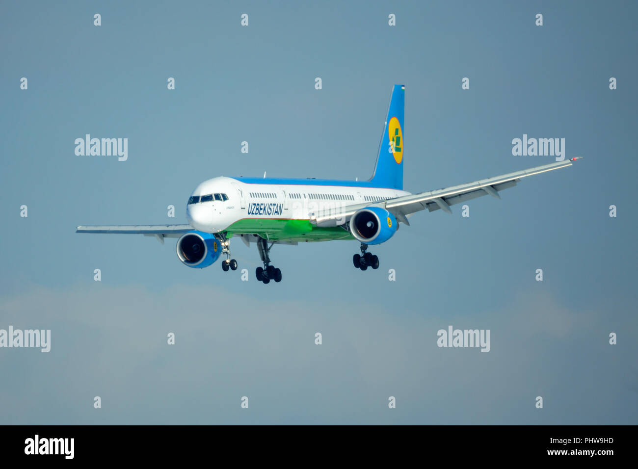 SAINT PETERSBURG, RUSSIA - APRIL 19, 2017: Flying the Boeing 757-23P (UK75701) airline «Uzbekistan Airways». The plane goes on landing at Pulkovo airp Stock Photo