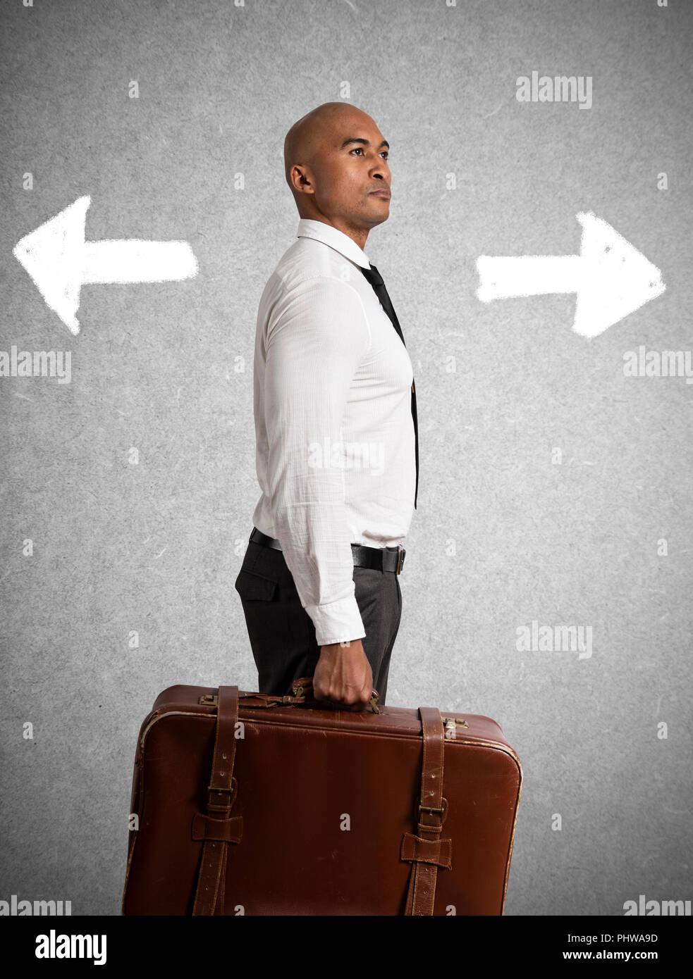 Businessman must choose between different destinations. concept of difficult career Stock Photo