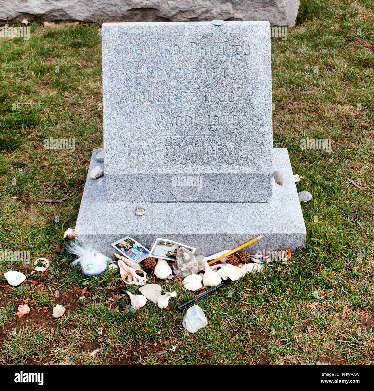 H.P. Lovecraft’s grave in Providence, Rhode Island honors the master of cosmic horror, drawing devoted fans and literary pilgrims. Stock Photo