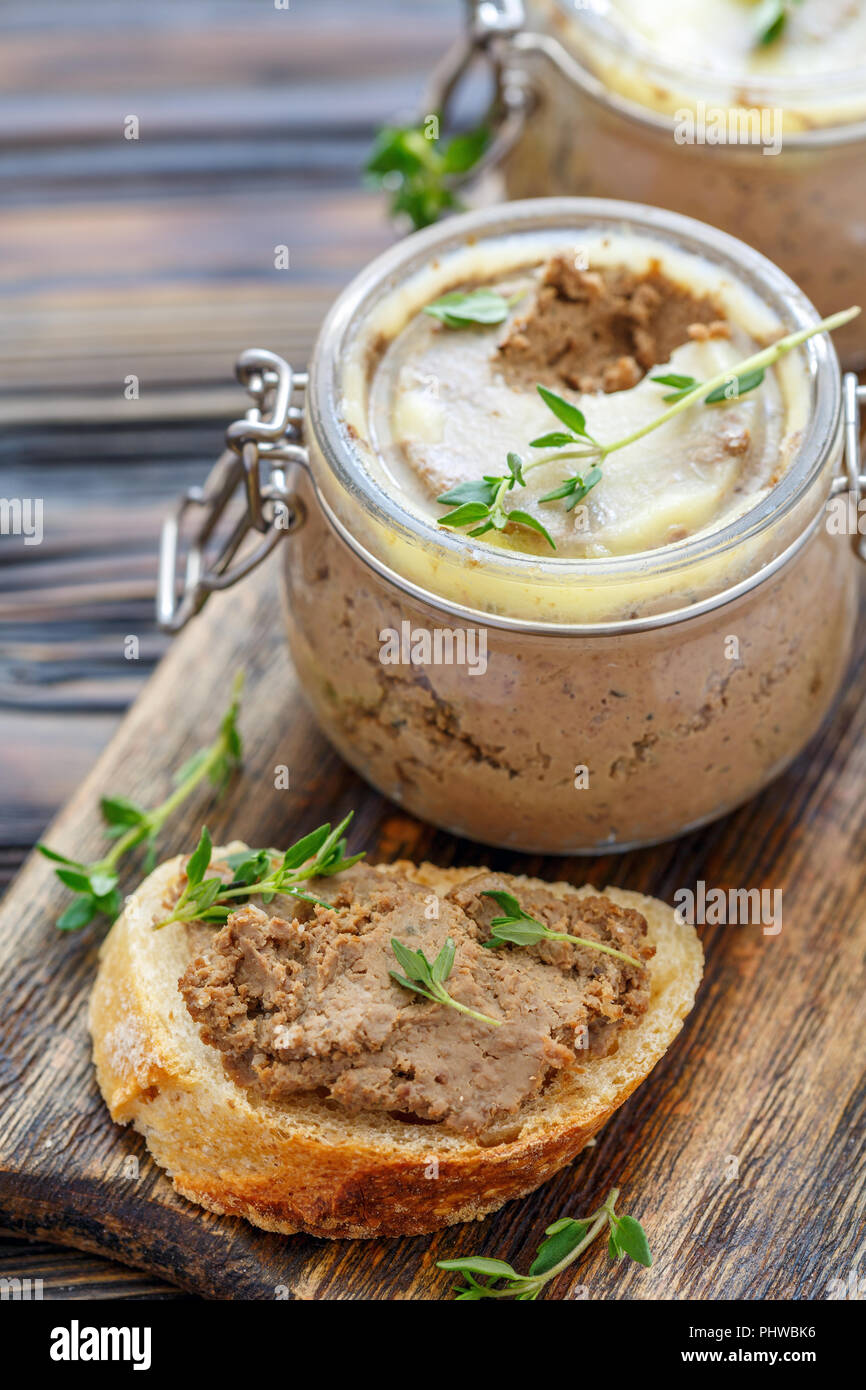 Slices of baguette with homemade liver pate. Stock Photo