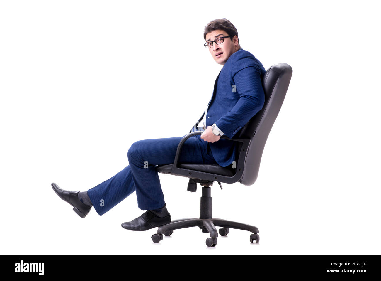 Businessman sitting on office chair isolated on white Stock Photo - Alamy