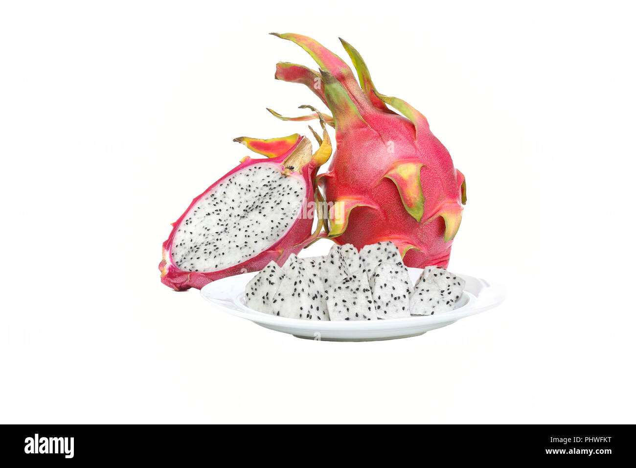 Fresh slice dragon Fruit on aplate isolated in white background Stock Photo