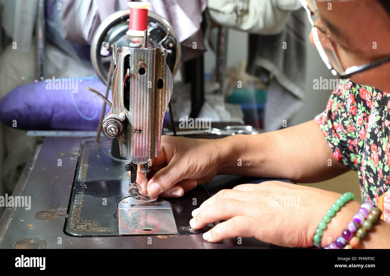 Threading needle hires stock photography and images Alamy