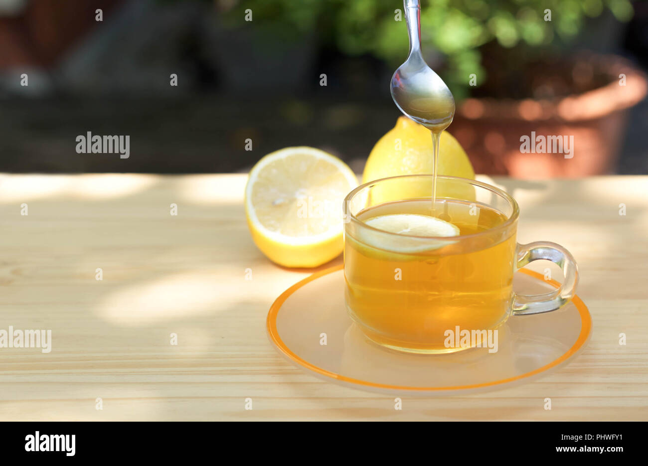Honey tea with lemon Stock Photo