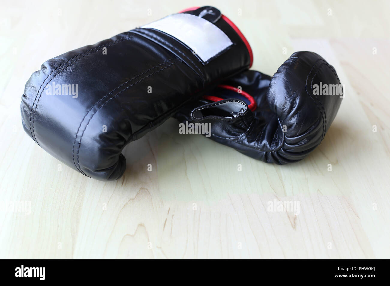 Pair of black leather boxing gloves Stock Photo Alamy