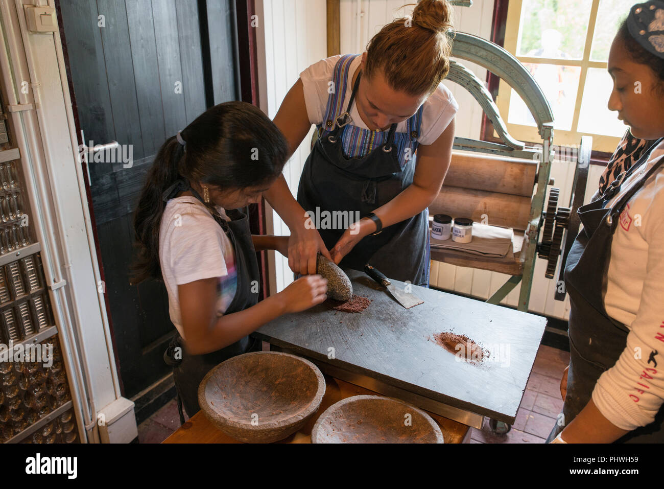 Zaandam,Holland,28aug2018young girl gets lessons in making chocolate