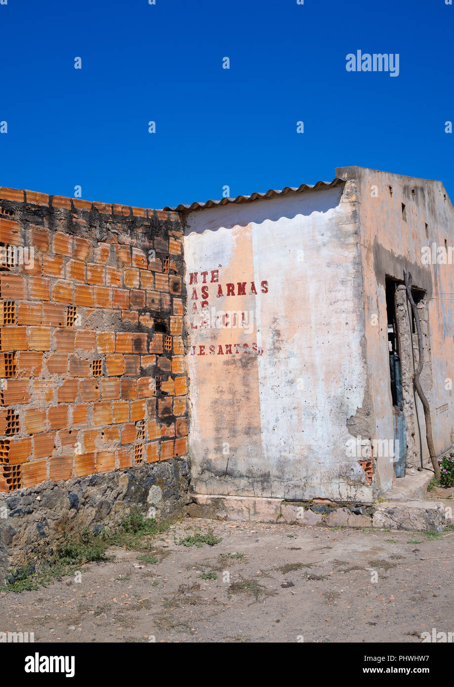 Old communist propaganda message written on a wall, Cunene Province