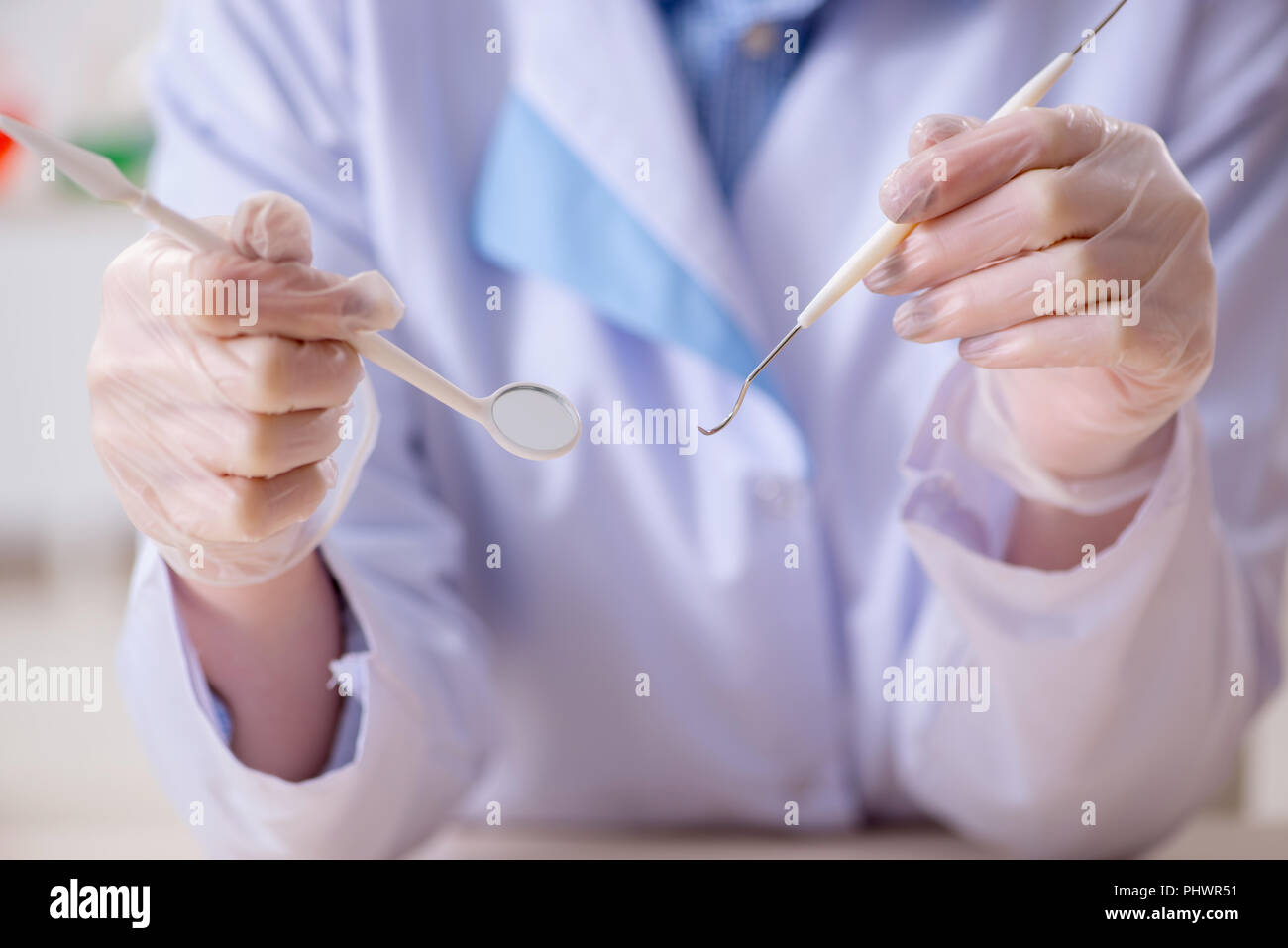 Dentist practicing work on tooth model Stock Photo Alamy