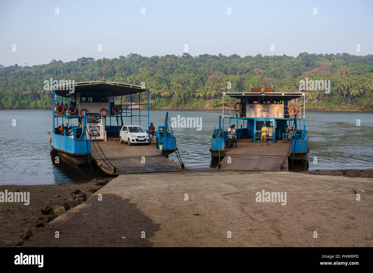 The Volvoi - Surla and Volvoi - Maina FerryBoats waiting side by side at Volvoi Ferry Terminal, Savoi-Verem, Goa, India Stock Photo