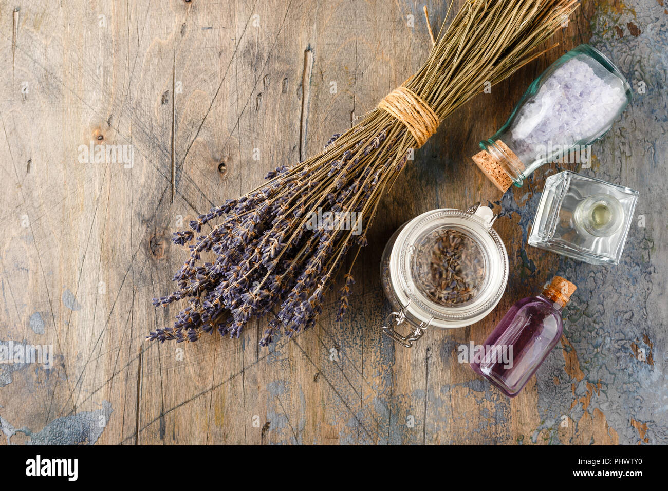 Essential lavender oil and dry lavender flowers Stock Photo Alamy