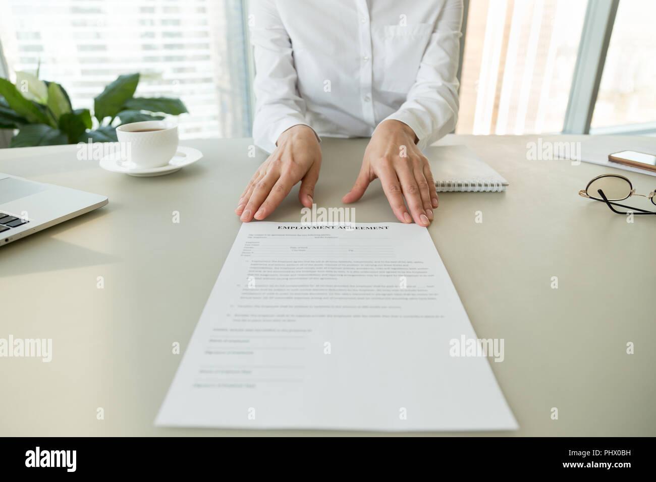 Female hr or employer offering employment agreement, close up vi Stock Photo