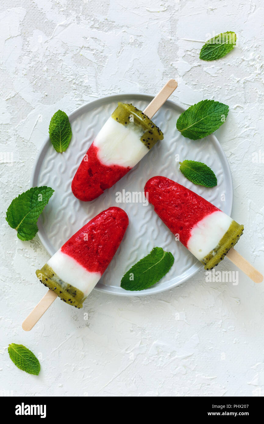 Yogurt popsicle with strawberries and kiwi Stock Photo Alamy