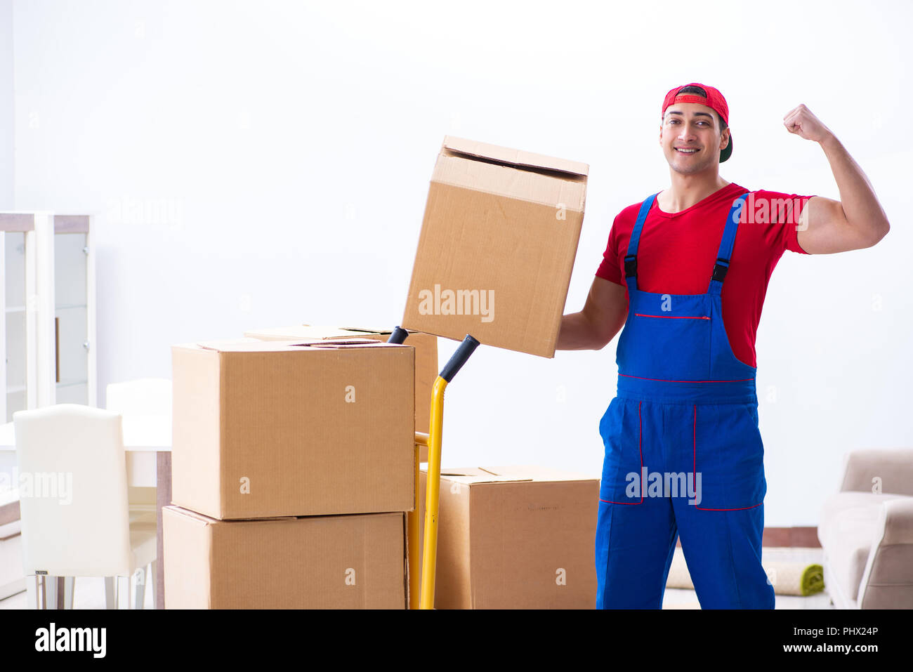 Contractor worker moving boxes during office move Stock Photo