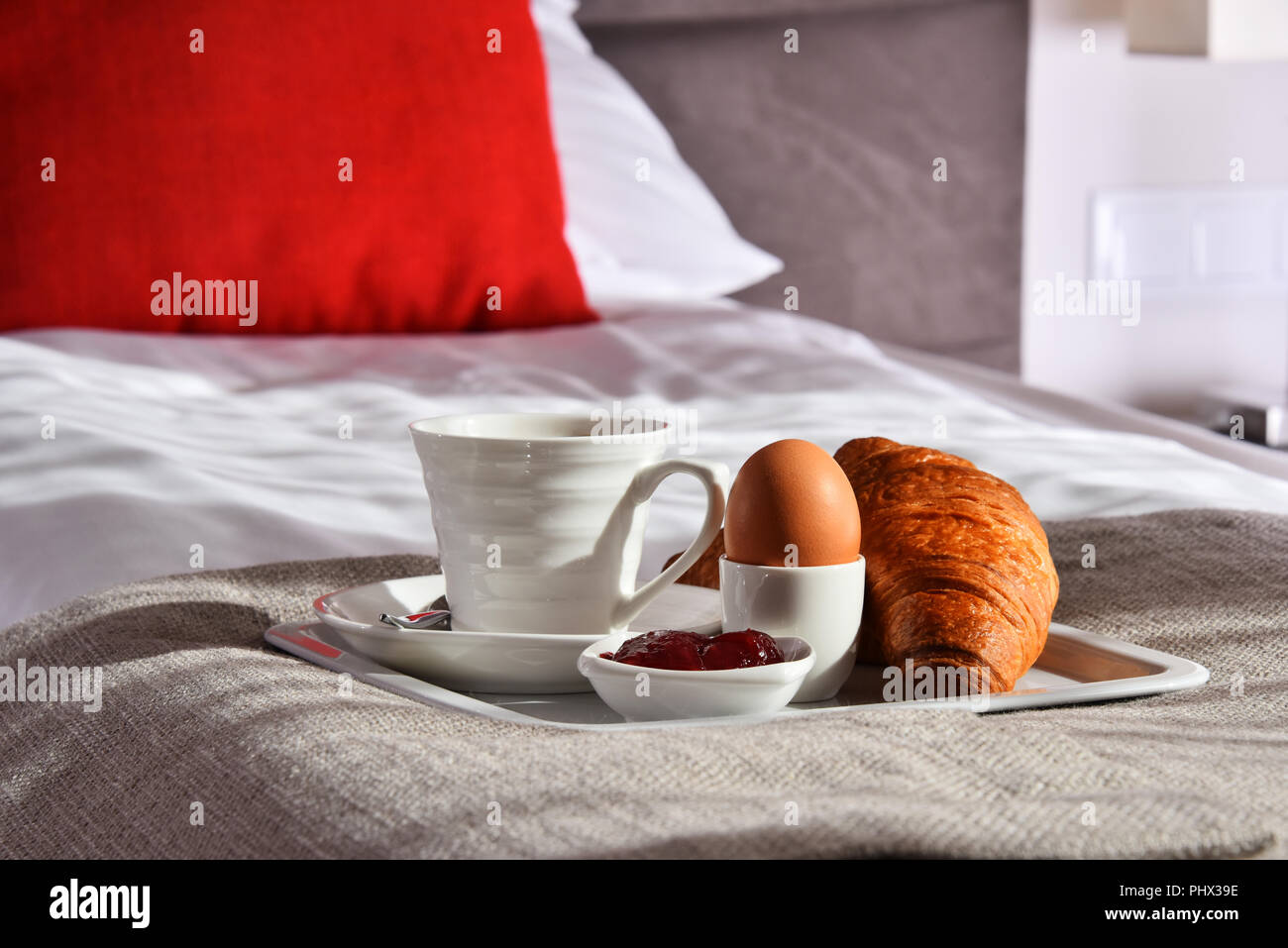 Breakfast on tray in bed in hotel room Stock Photo - Alamy