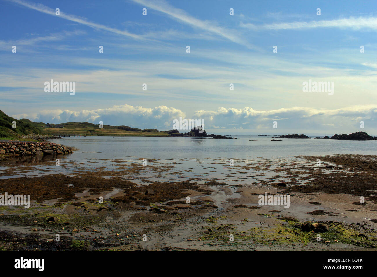Castle ruins at the seas edge on the scottish Isle of Islay on a lovely summers day. Stock Photo