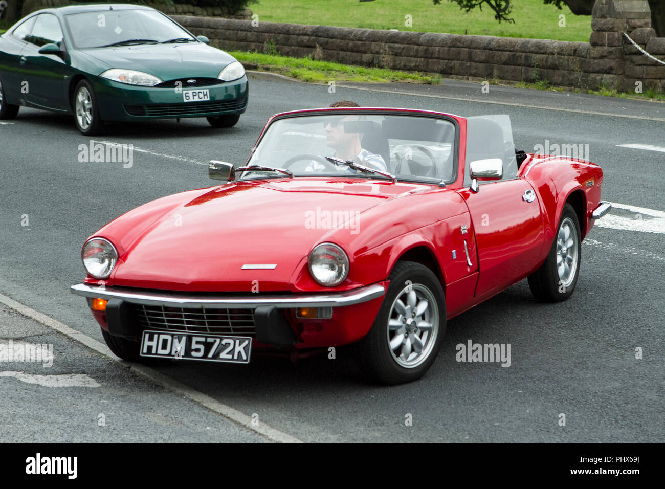 Red Triumph Spitfire at Hoghton towers annual classic vintage car rally, UK Stock Photo