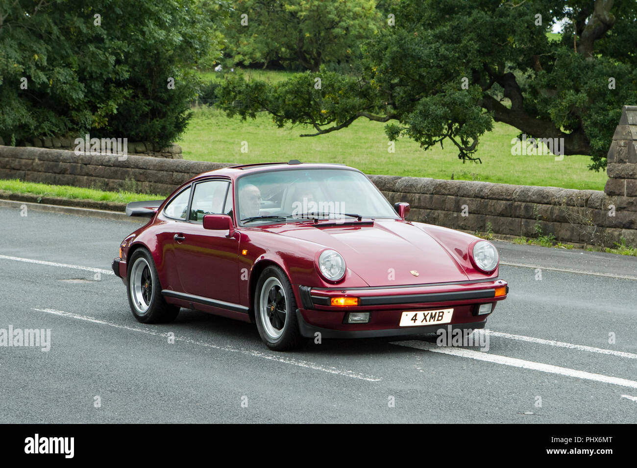 Red 4XMB 1989 Porsche Carrera Coupe Sport at Hoghton towers annual classic vintage car rally, UK Stock Photo