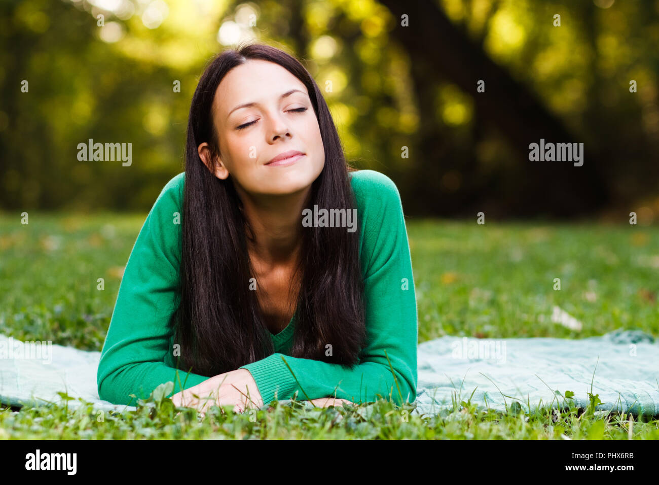 Woman resting in nature hi-res stock photography and images - Alamy