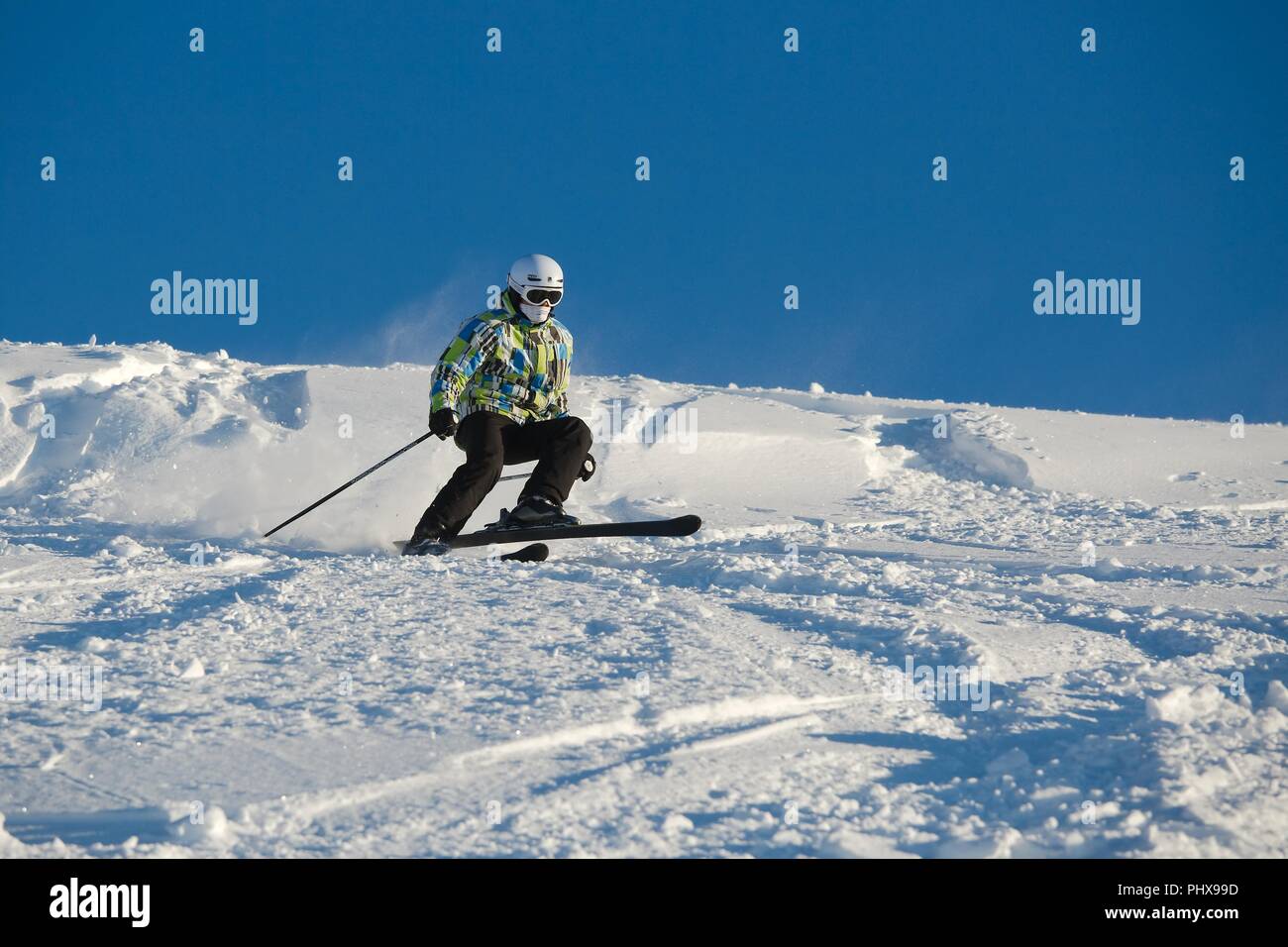 Skiing in fresh powder snow Stock Photo Alamy