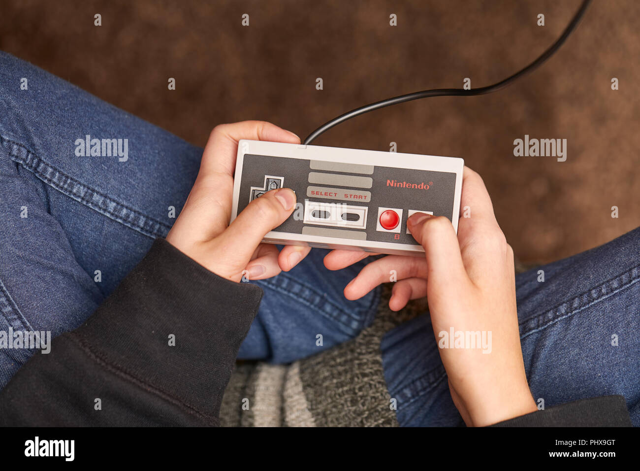 Nintengo NES,playing Super Mario 3 Stock Photo