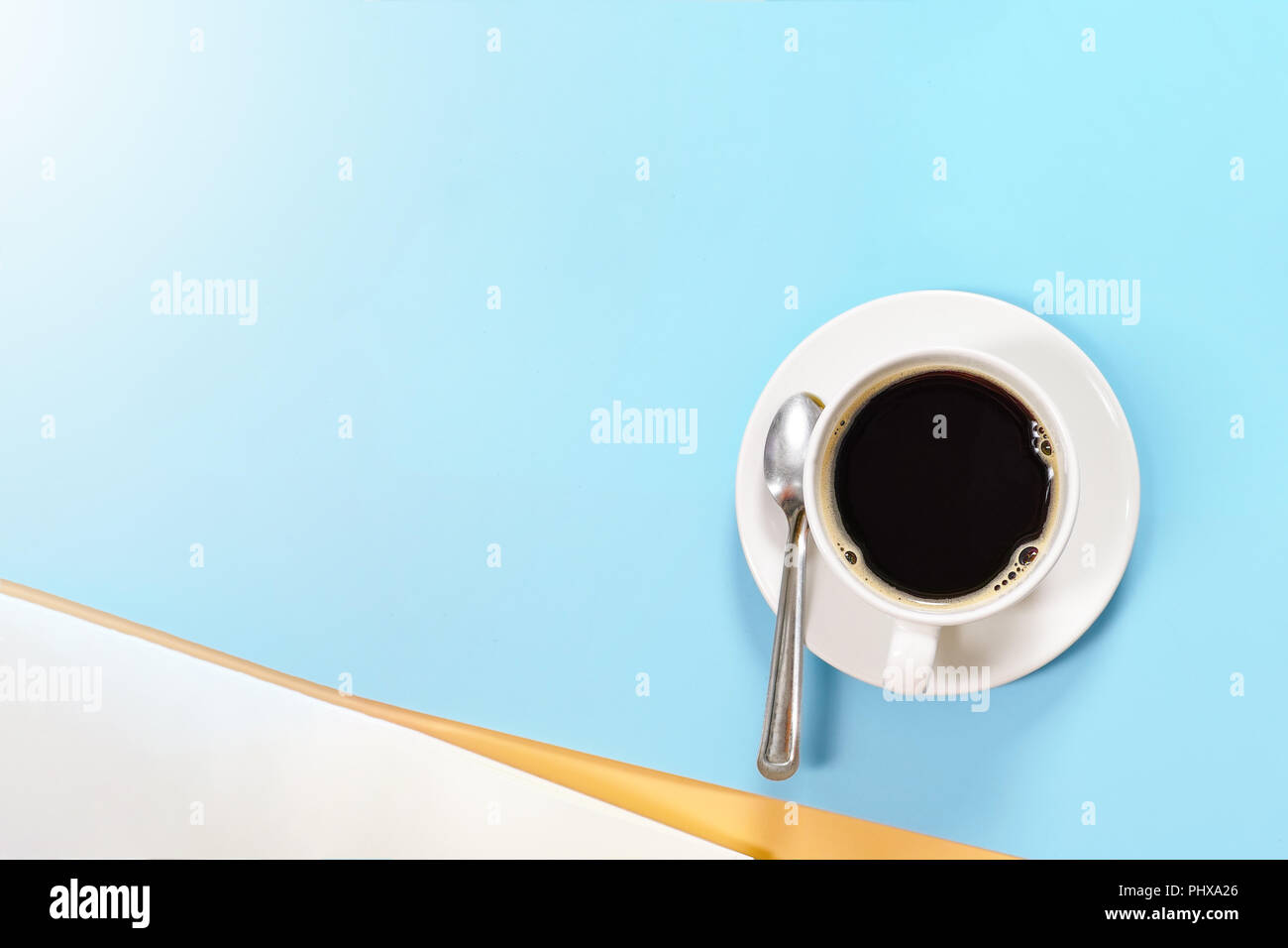 White hot coffee cup on blue pastel background with copy space for put text or object top view minimal style Stock Photo