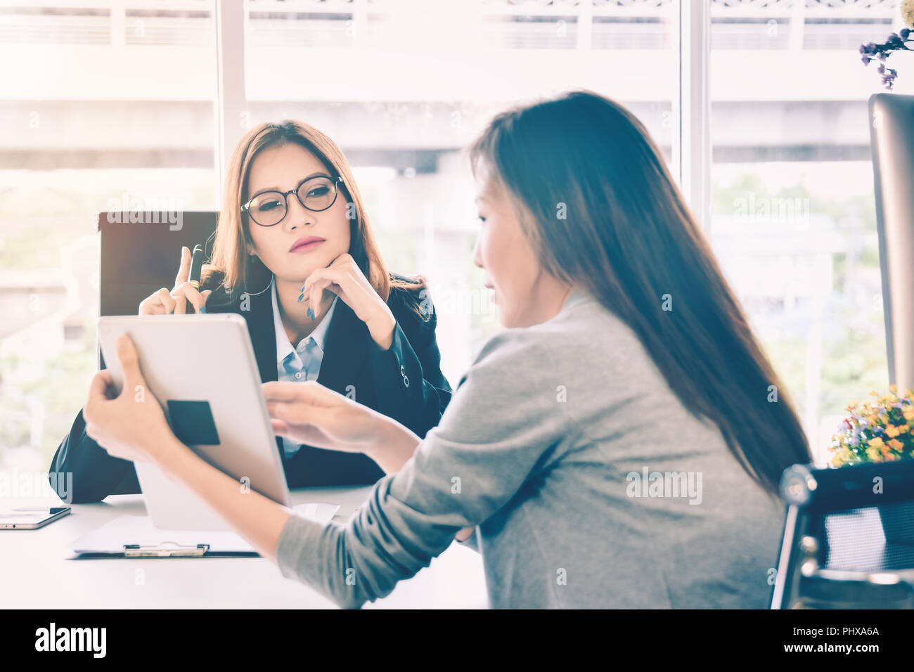 Business woman people presenting business planning and finance report from tablet for ceo in office room Stock Photo