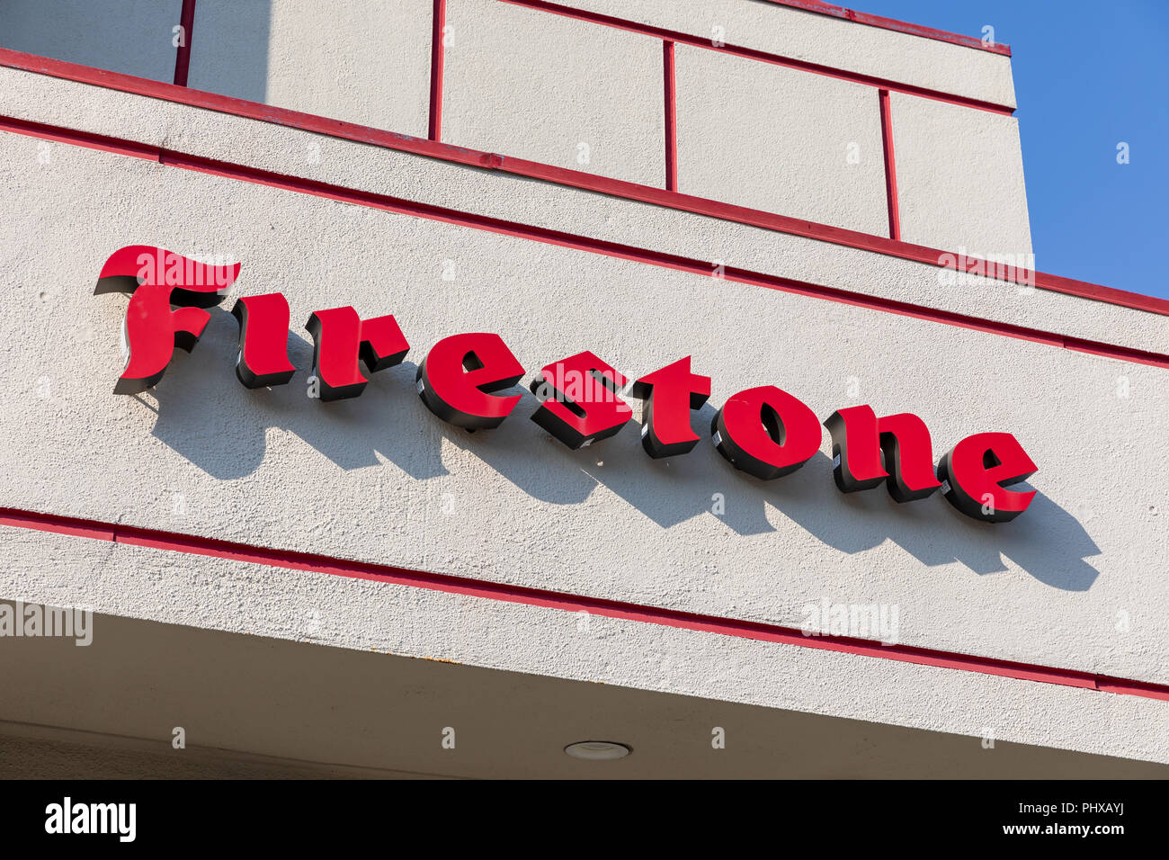 Firestone (Firestone Tire and Rubber Company) sign on facade; Sunnyvale, California Stock Photo