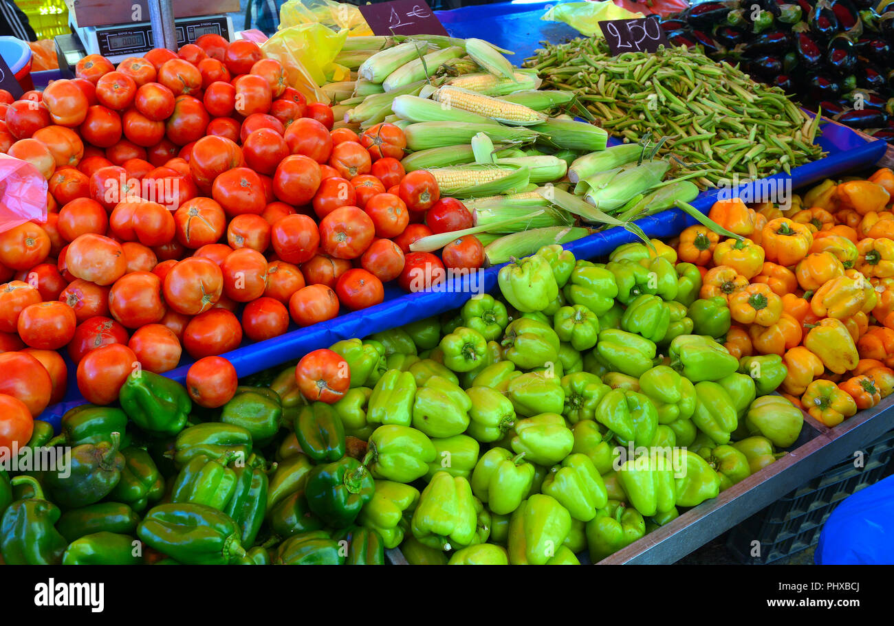 many different ecological vegetables on market table Stock Photo